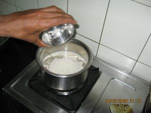 Add Bajra flour to hot water